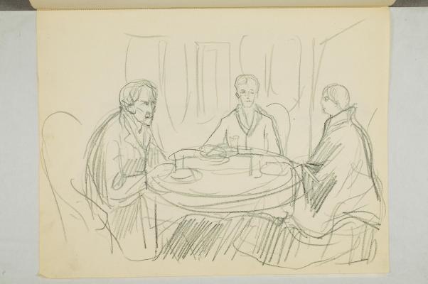 Tre mennesker ved et bord